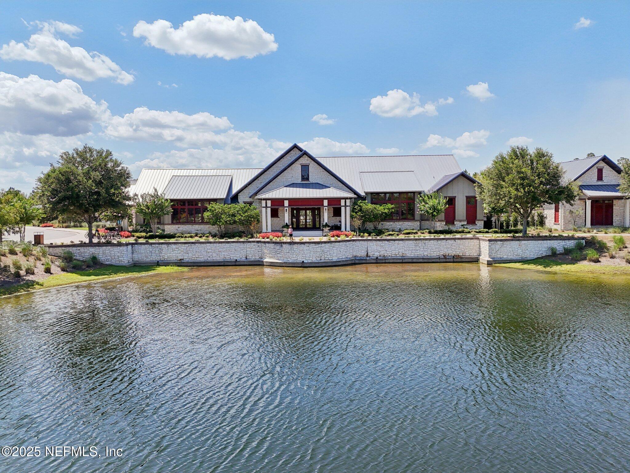 48 Gilchrist Way St. Augustine, FL 32092 - Photo 40 of 50 a view of an swimming pool with outdoor seating