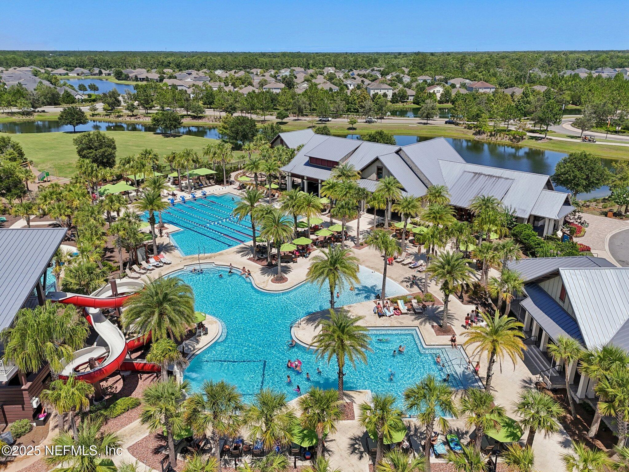 48 Gilchrist Way St. Augustine, FL 32092 - Photo 45 of 50 an aerial view of residential houses with outdoor space and swimming pool