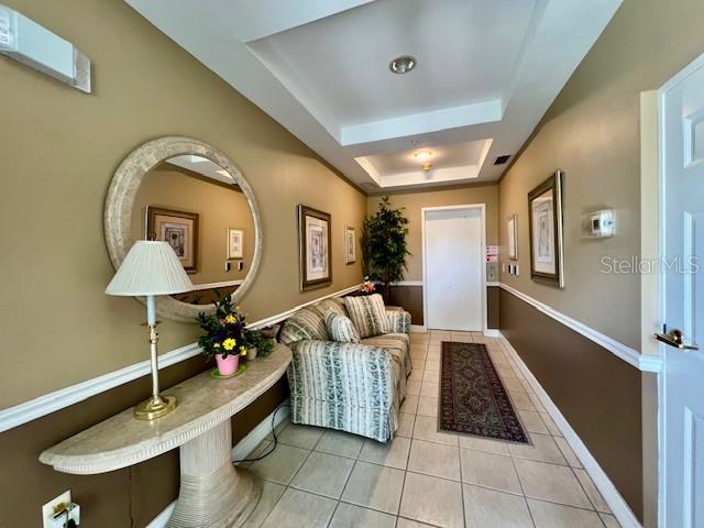 3471 Sunset Key Circle, Unit 102 Punta Gorda, FL 33955 - Photo 11 of 51 a living room with furniture and a potted plant