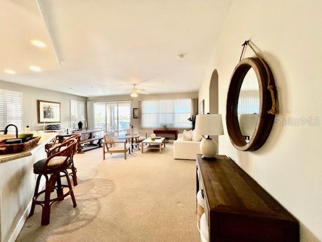 3471 Sunset Key Circle, Unit 102 Punta Gorda, FL 33955 - Photo 16 of 51 a view of a livingroom with furniture and a window