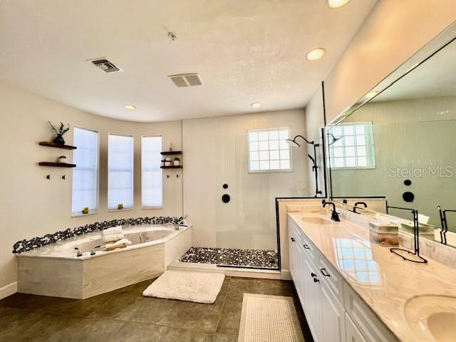 3471 Sunset Key Circle, Unit 102 Punta Gorda, FL 33955 - Photo 29 of 51 a large white kitchen with a large window