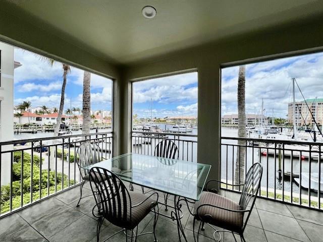 3471 Sunset Key Circle, Unit 102 Punta Gorda, FL 33955 - Photo 3 of 51 a view of a chairs and table in balcony