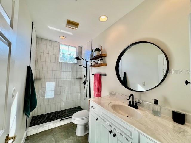 3471 Sunset Key Circle, Unit 102 Punta Gorda, FL 33955 - Photo 31 of 51 a bathroom with a sink a toilet and a mirror