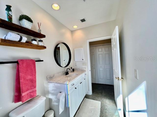 3471 Sunset Key Circle, Unit 102 Punta Gorda, FL 33955 - Photo 32 of 51 a bathroom with a sink and a mirror