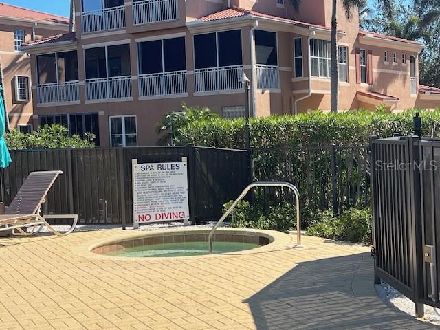 3471 Sunset Key Circle, Unit 102 Punta Gorda, FL 33955 - Photo 9 of 51 a house view with a swimming pool