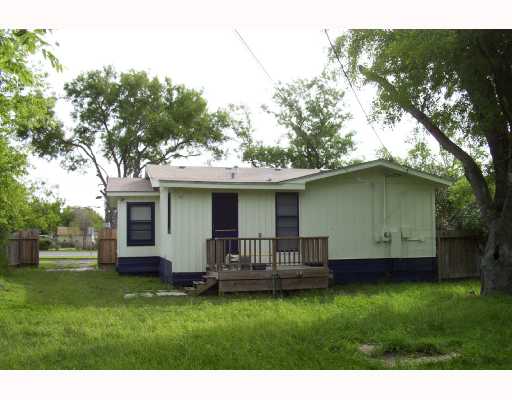 3045 South Staples Street Corpus Christi, TX 78404 - Photo 2 of 8 a view of a backyard with a garden and plants