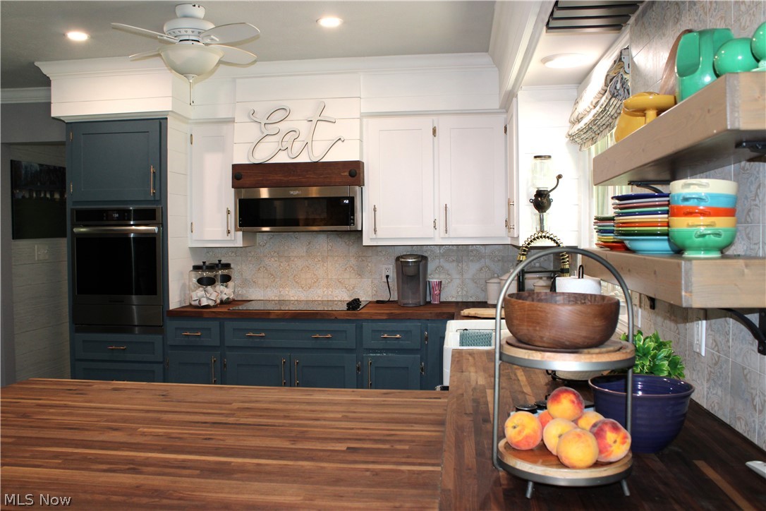 5547 River Styx Road Medina, OH 44256 - Photo 11 of 45 Kitchen featuring rich wood-finish countertops
