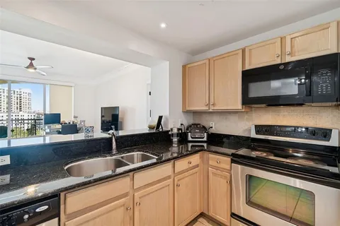 a bedroom with a large bed and a large window