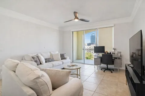 a kitchen with a table and chairs in it