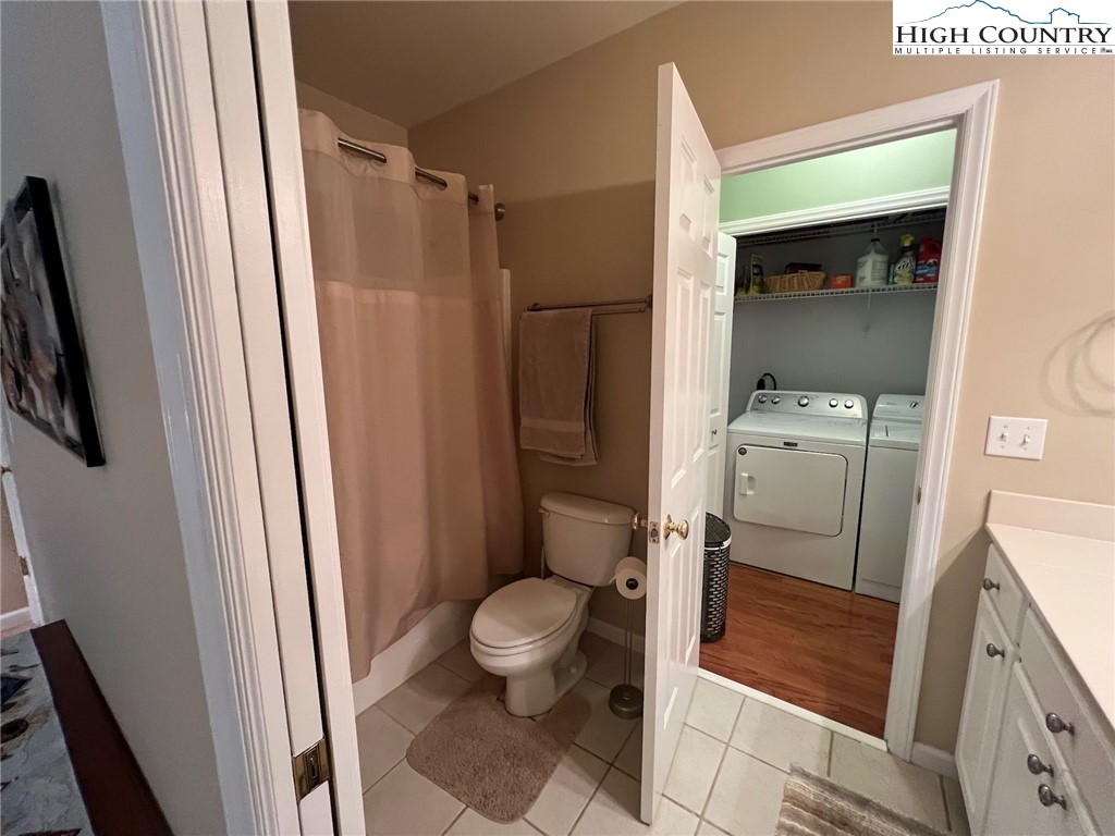 135 Caleb Drive, Unit 4 Blowing Rock, NC 28605 - Photo 14 of 19 a bathroom with a sink toilet and shower