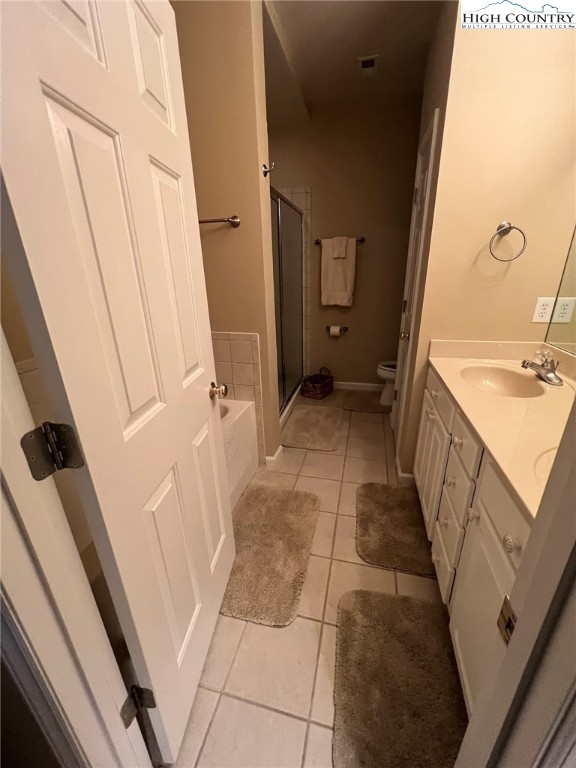 135 Caleb Drive, Unit 4 Blowing Rock, NC 28605 - Photo 15 of 19 a bathroom with a granite countertop shower and a sink