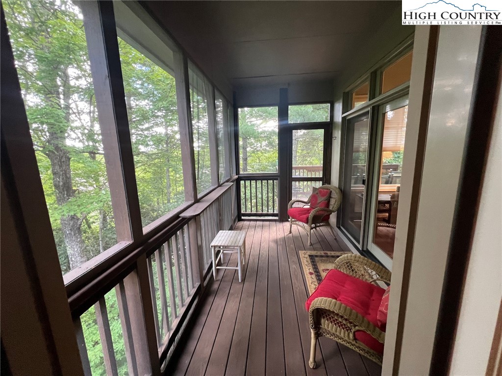 135 Caleb Drive, Unit 4 Blowing Rock, NC 28605 - Photo 18 of 19 a view of living room with wooden floor and furniture