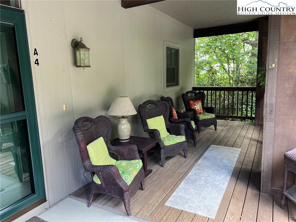 135 Caleb Drive, Unit 4 Blowing Rock, NC 28605 - Photo 19 of 19 a living room with furniture and a large window