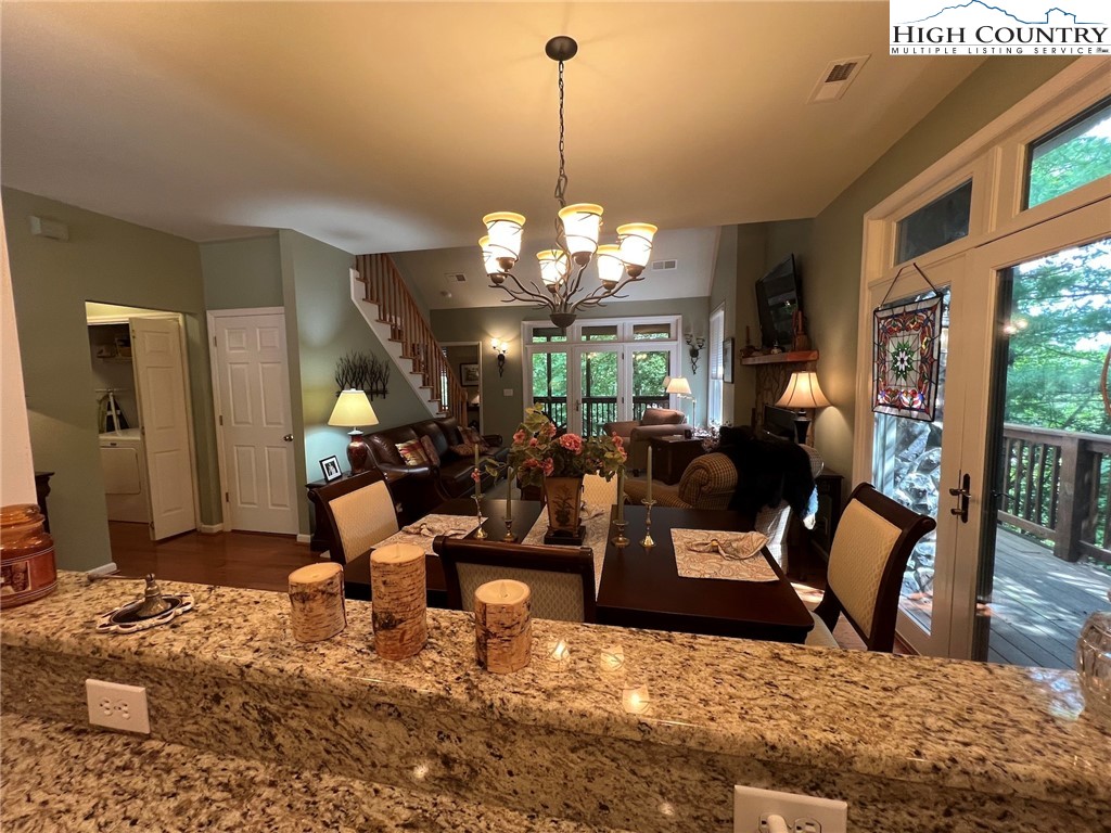 135 Caleb Drive, Unit 4 Blowing Rock, NC 28605 - Photo 2 of 19 a living room filled with furniture