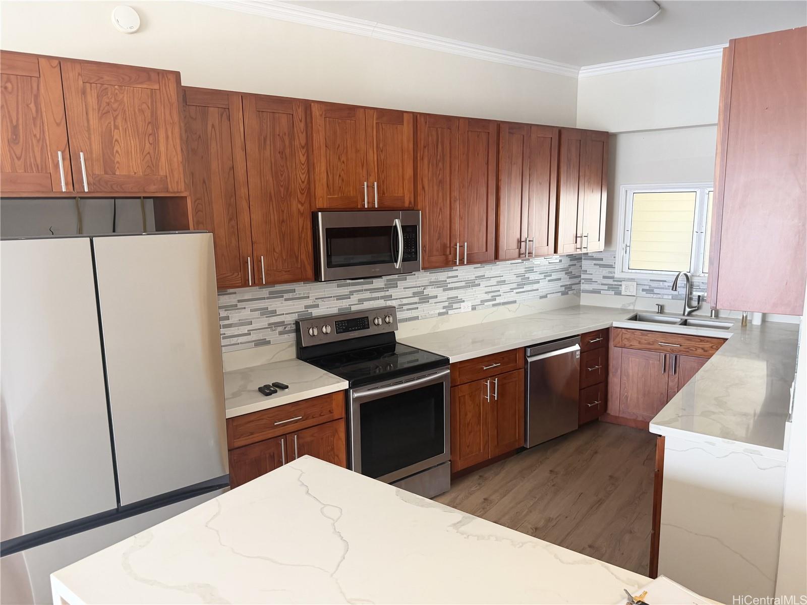 469 Ena Road, Unit 2103 Honolulu, HI 96815 - Photo 3 of 22 Upgraded kitchen with new cabinets, counters and appliances.