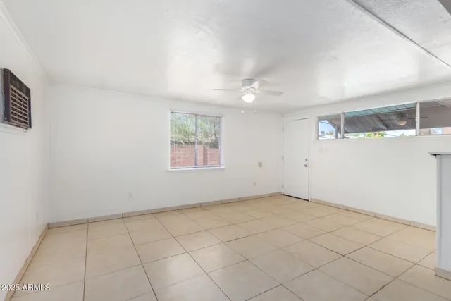 an empty room with windows