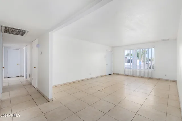 an empty room with windows