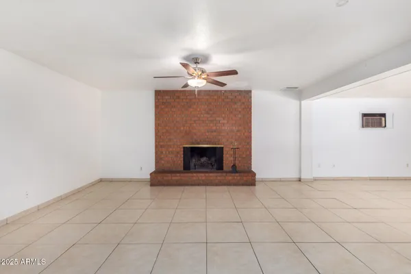 a living room with a fireplace