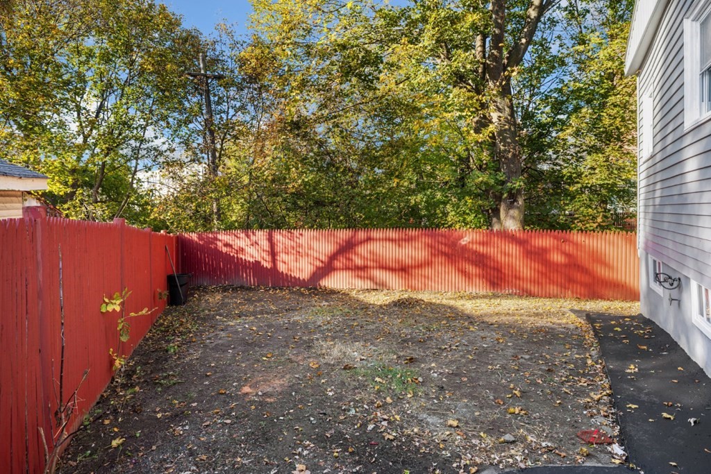 28 Warren Street Peabody, MA 01960 - Photo 32 of 37 a view of a yard with an trees