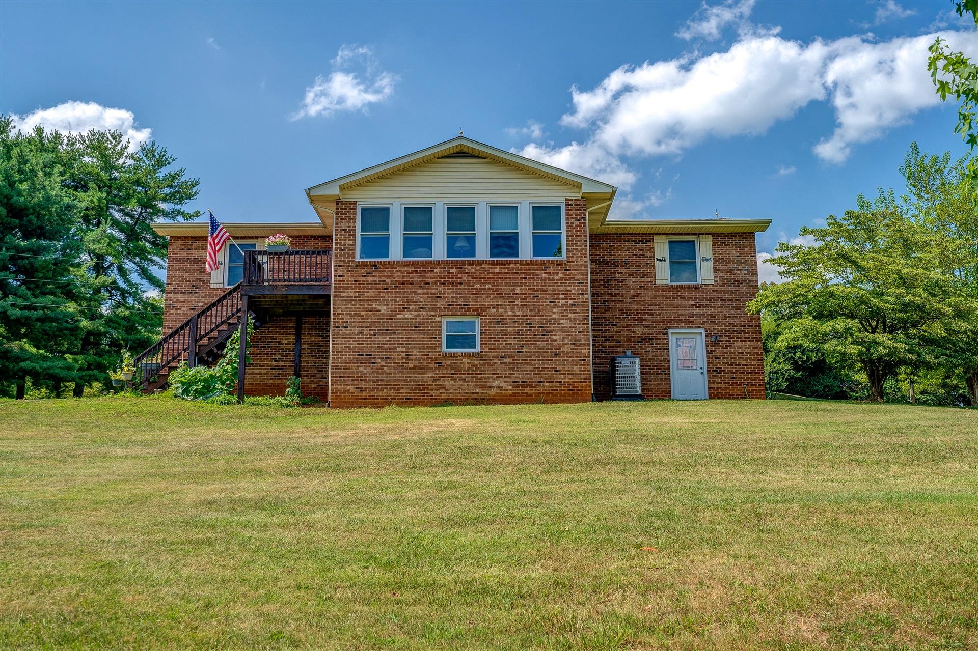 5756 White House Road Moneta, VA 24121 - Photo 3 of 35 a front view of a house with a yard