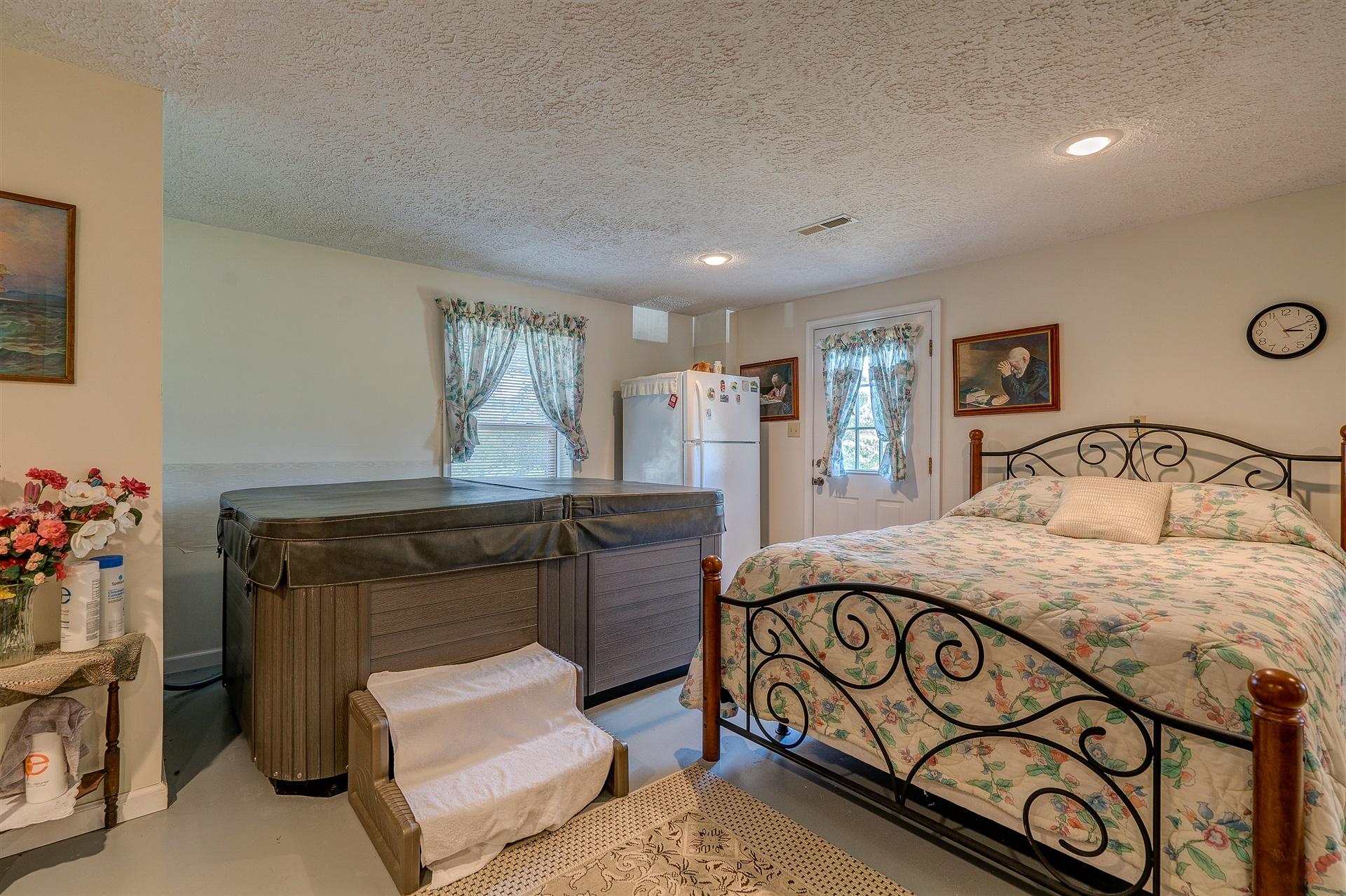 5756 White House Road Moneta, VA 24121 - Photo 21 of 35 a bedroom with a bed and a dresser