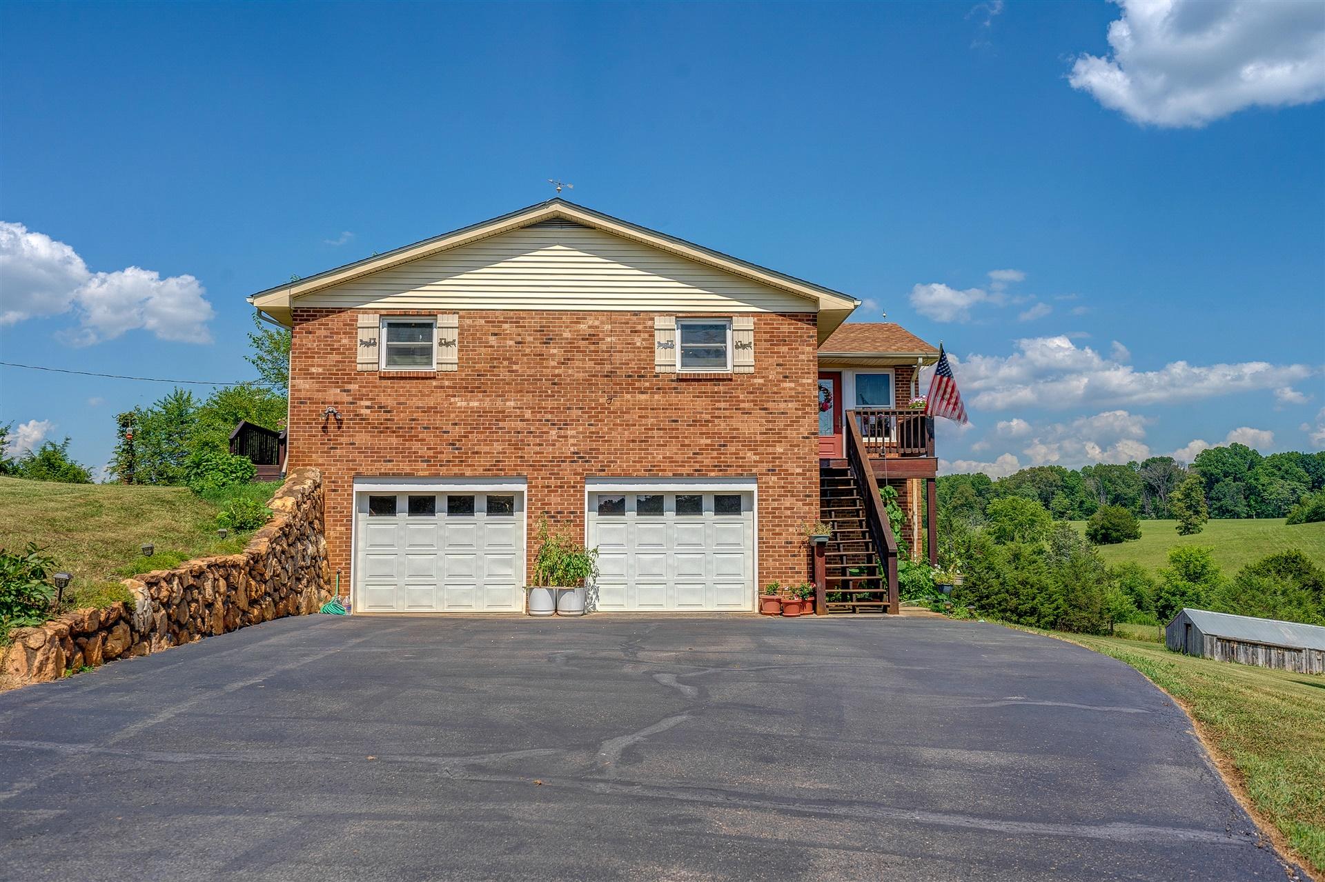 5756 White House Road Moneta, VA 24121 - Photo 33 of 35 a front view of a house with a yard