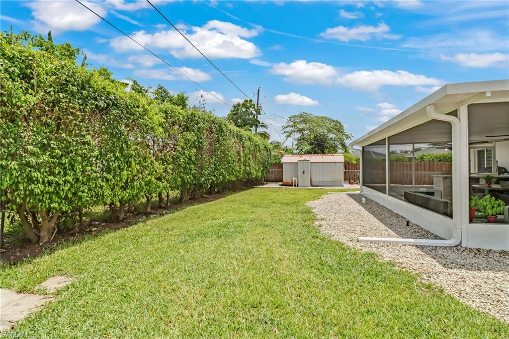 5131 31st Place Southwest Naples, FL 34116 - Photo 23 of 24 a view of a backyard with pathway
