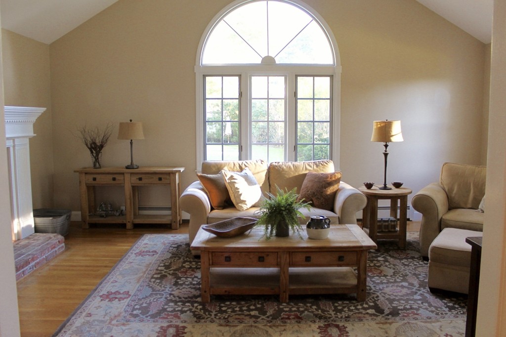 8 Brookside Lane Sterling, MA 01564 - Photo 7 of 26 a living room with furniture and wooden floor