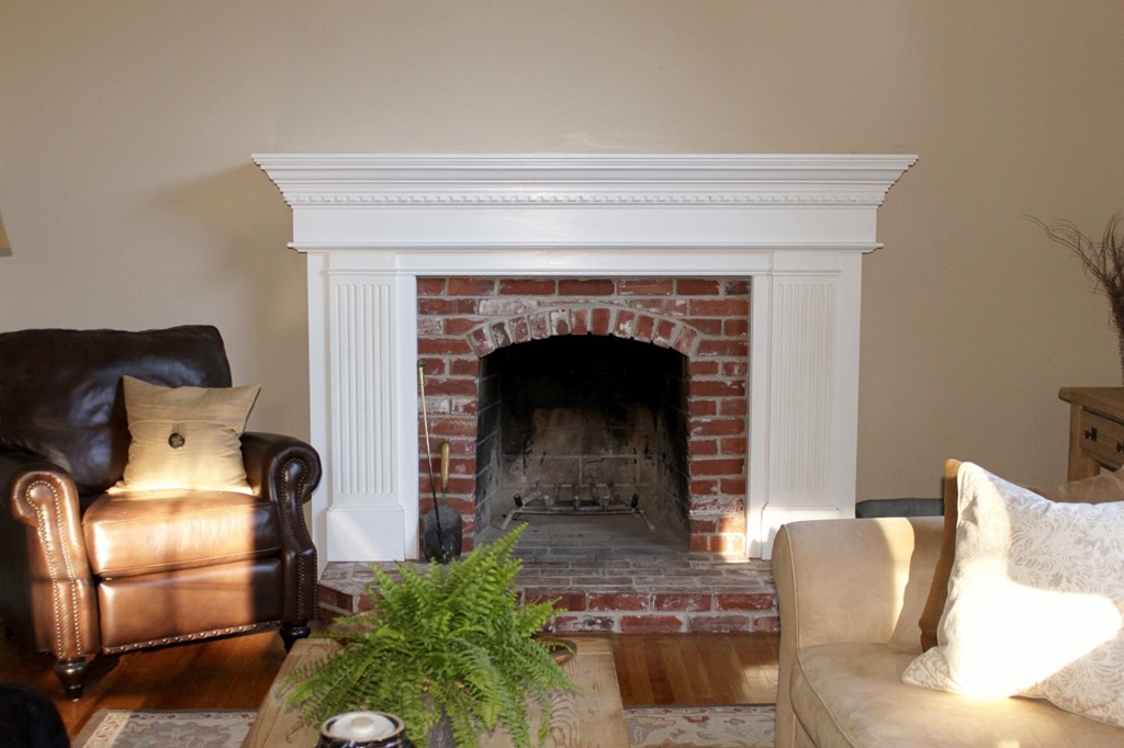 8 Brookside Lane Sterling, MA 01564 - Photo 8 of 26 a living room with furniture and a fireplace