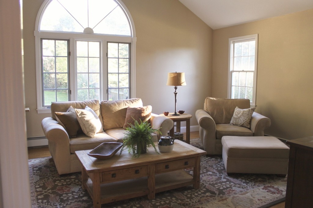 8 Brookside Lane Sterling, MA 01564 - Photo 9 of 26 a living room with furniture and a large window
