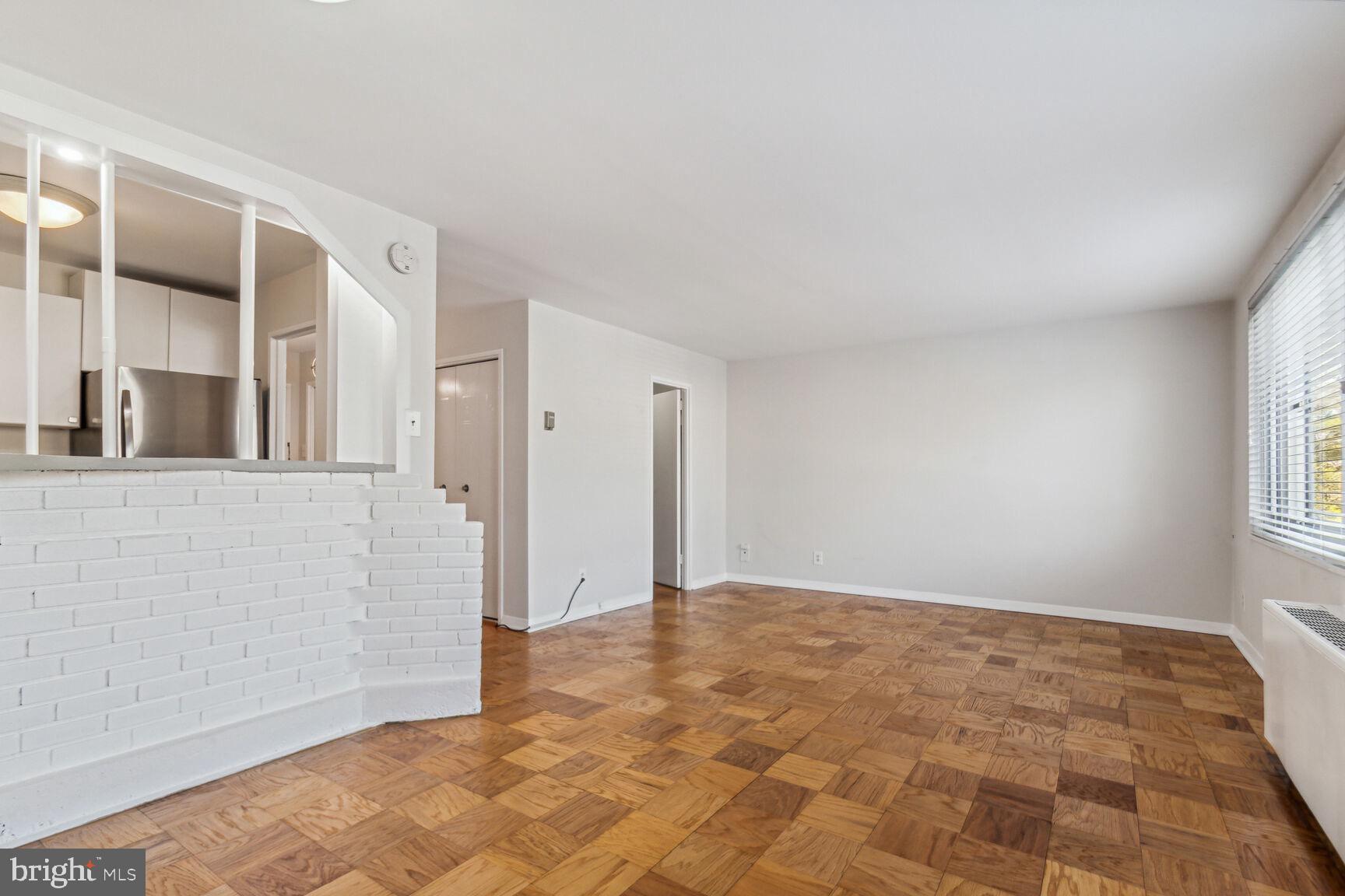 1900 Lyttonsville Road, Unit 403 Silver Spring, MD 20910 - Photo 4 of 18 Living/Dining Area