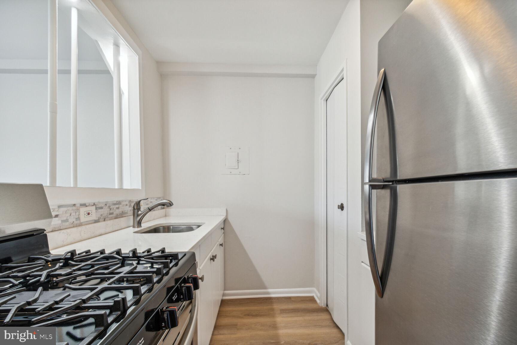 1900 Lyttonsville Road, Unit 403 Silver Spring, MD 20910 - Photo 6 of 18 Updated Kitchen with Pantry