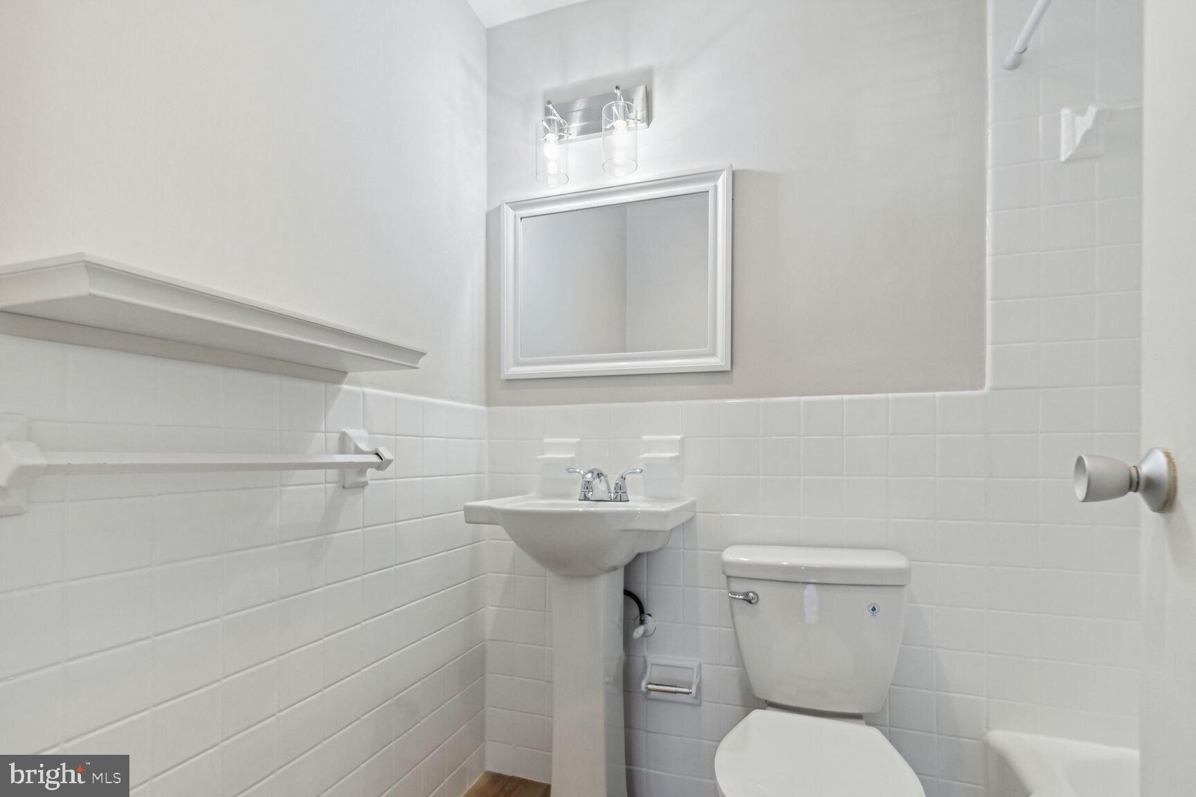 1900 Lyttonsville Road, Unit 403 Silver Spring, MD 20910 - Photo 8 of 18 Renovated Bathroom
