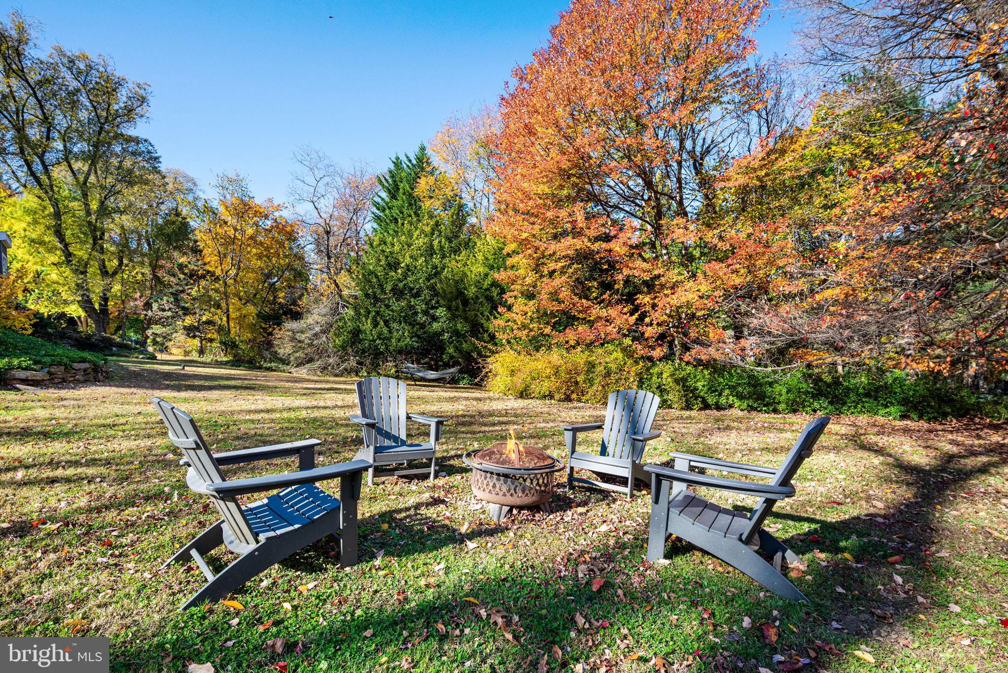 1424 Flat Rock Road Penn Valley, PA 19072 - Photo 6 of 33 a view of a bench in a backyard