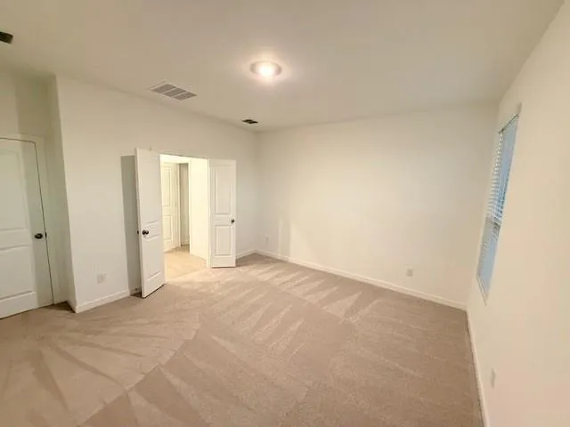 an empty room with a natural light