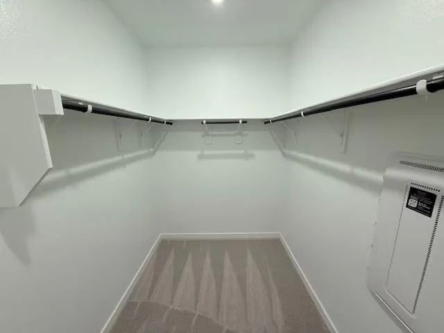 a view of a room with racks on the wall