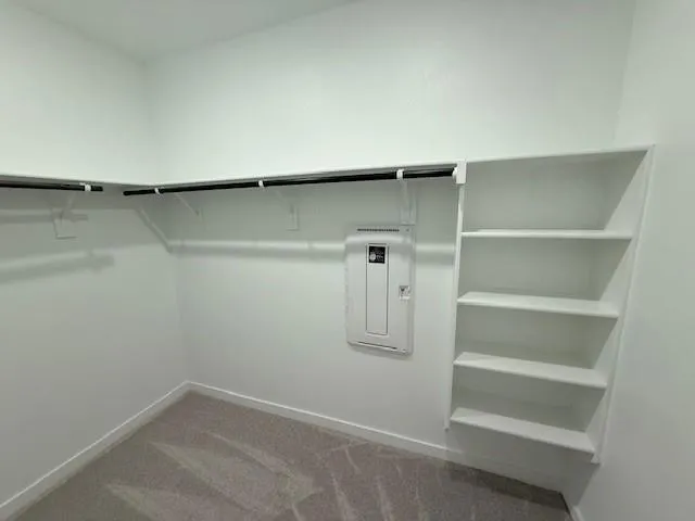 a view of an empty walk in closet