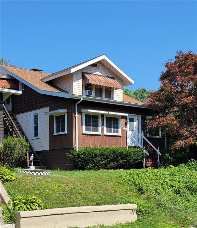 747 Virginia Avenue Rochester, PA 15074 - Photo 1 of 25 a front view of a house with a yard