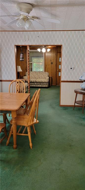 747 Virginia Avenue Rochester, PA 15074 - Photo 8 of 25 a dining room with furniture and a garden