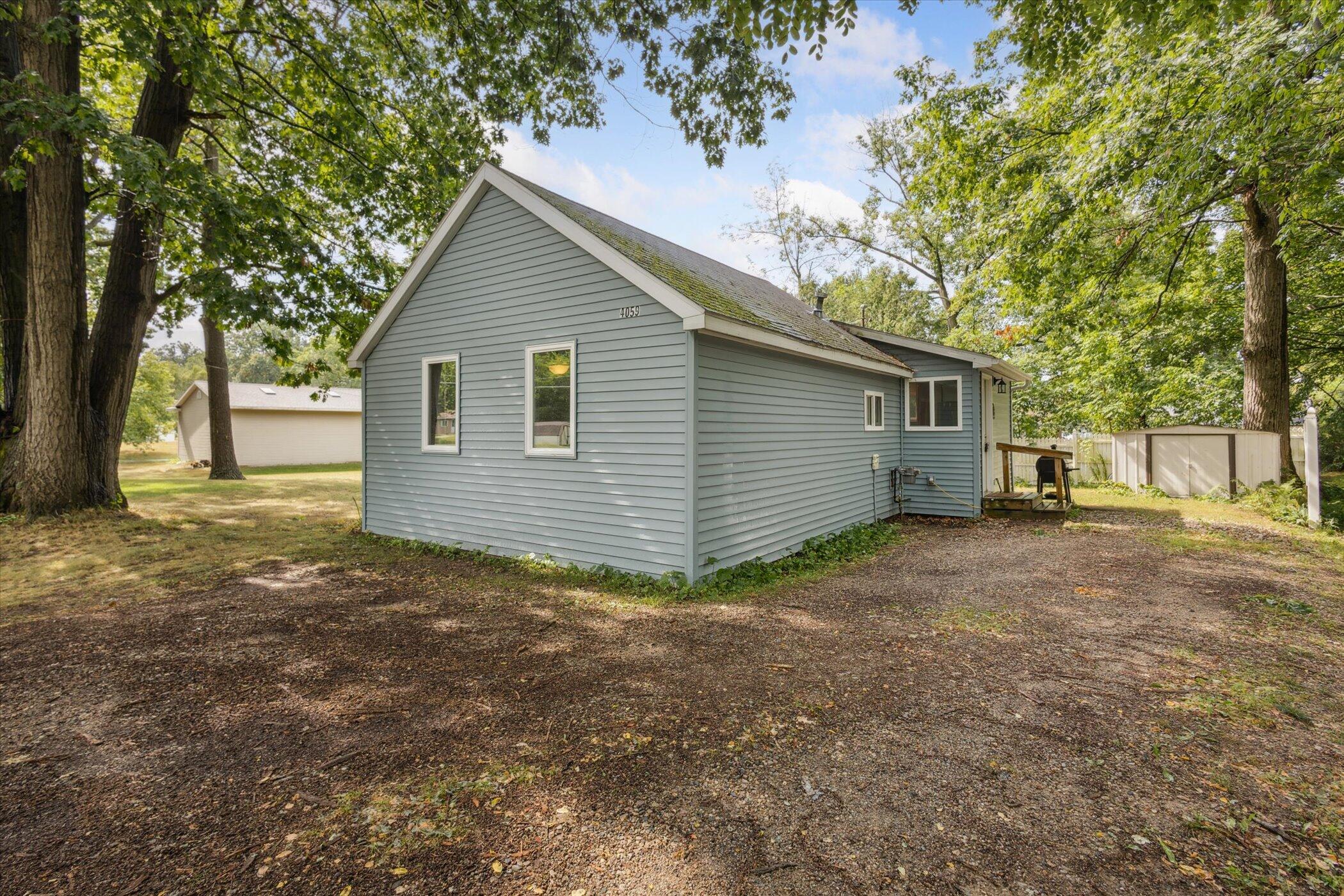 4059 West Stanton Road Stanton, MI 48888 - Photo 1 of 26 03-4059-W-Stanton-Rd-Stanton-MI-48888-Wi