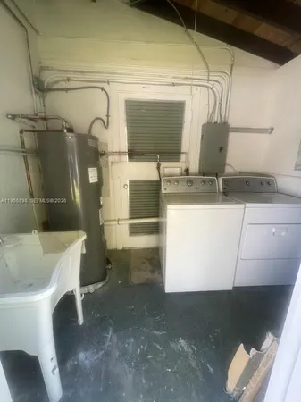 a bathroom with a sink and mirror