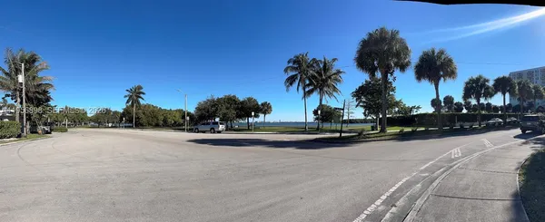 a view of a street with a houses