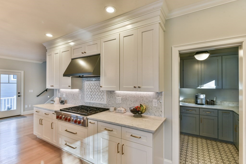 15 Lakeview Road Webster, MA 01570 - Photo 12 of 42 a kitchen with a stove and cabinets