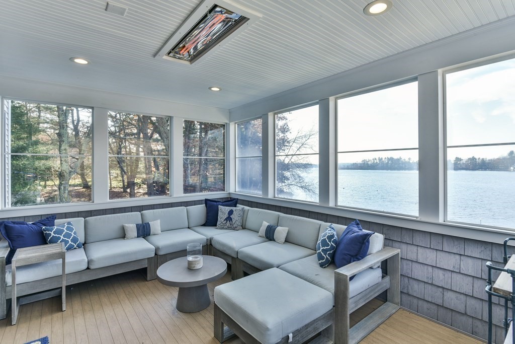 15 Lakeview Road Webster, MA 01570 - Photo 16 of 42 a living room with furniture and a large window