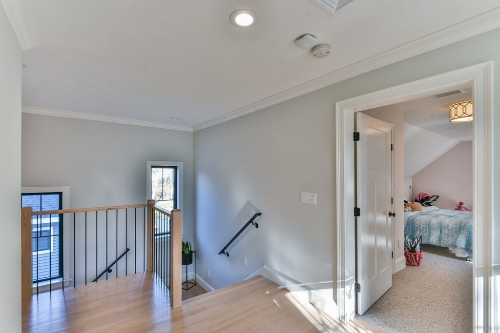 15 Lakeview Road Webster, MA 01570 - Photo 18 of 42 a view of a hallway with bedroom and wooden floor