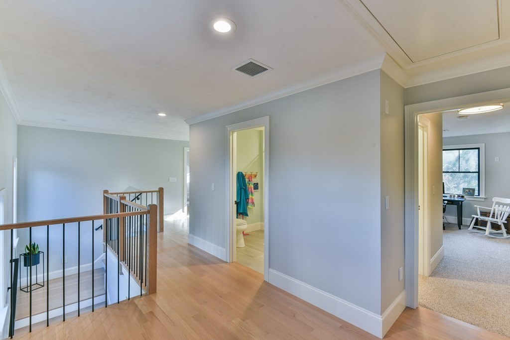 15 Lakeview Road Webster, MA 01570 - Photo 23 of 42 a view of hallway with wooden floor and a living room