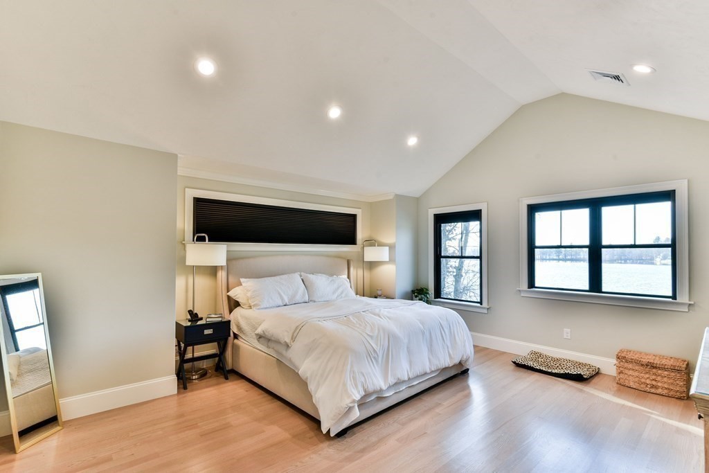 15 Lakeview Road Webster, MA 01570 - Photo 27 of 42 a bedroom with a bed and a window