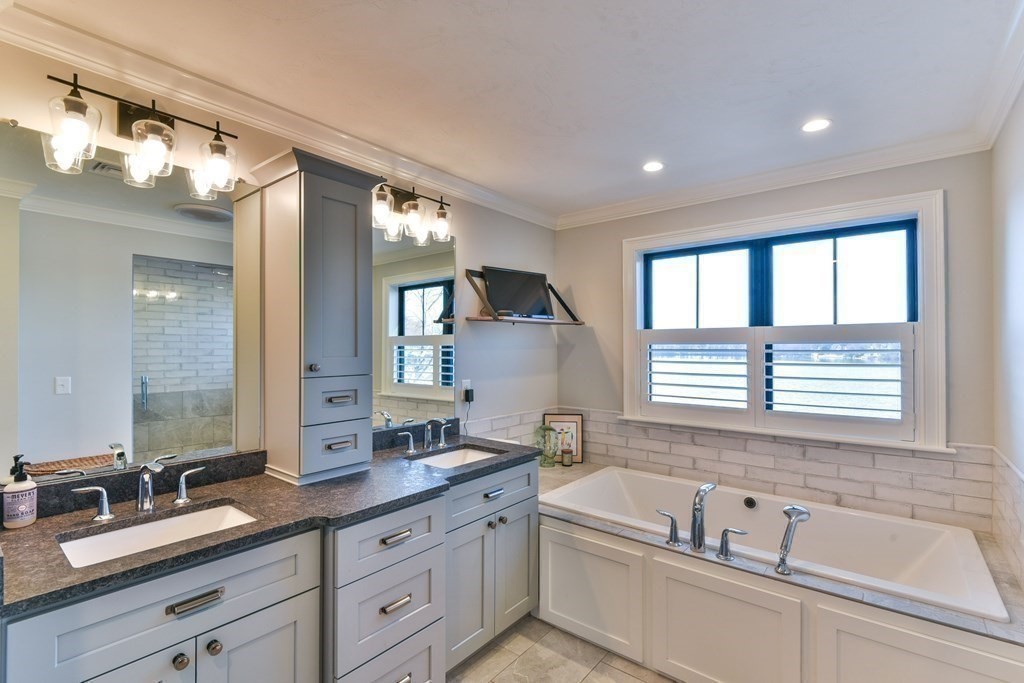 15 Lakeview Road Webster, MA 01570 - Photo 30 of 42 a bathroom with a granite countertop sink mirror bathtub and double
