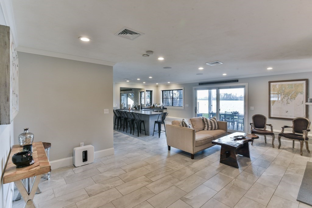 15 Lakeview Road Webster, MA 01570 - Photo 33 of 42 a living room with furniture and view of kitchen