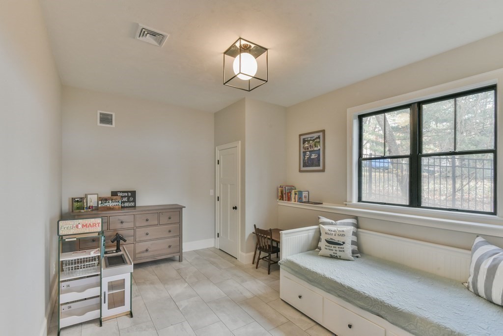 15 Lakeview Road Webster, MA 01570 - Photo 38 of 42 a spacious bedroom with a bed and a window